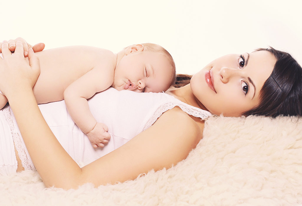 baby sleeps on tummy with face in mattress