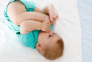 baby sucking toes