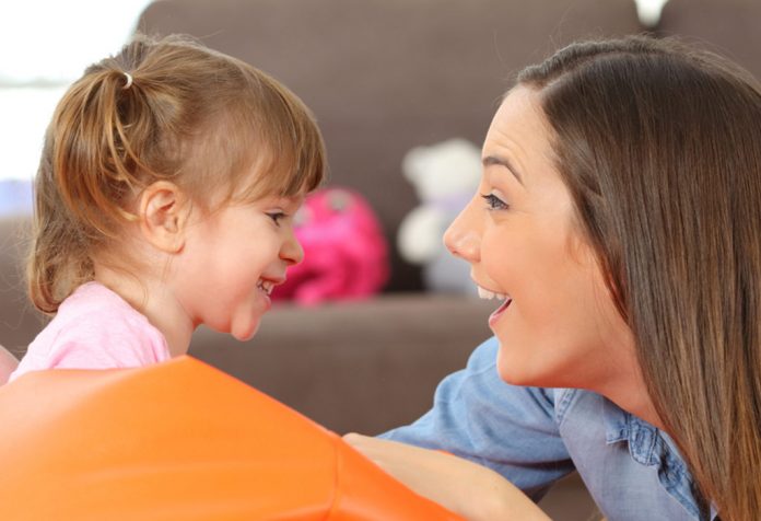 Child talking to mother